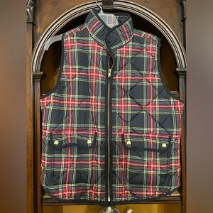 JCrew plaid quilted vest.  Black background with red , white and yellow